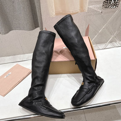 Miu Miu "Loafer" Knee-High Boots.