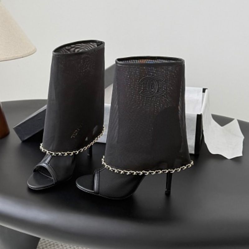Chanel Mesh Peep-Toe Bootie Sandals in black.