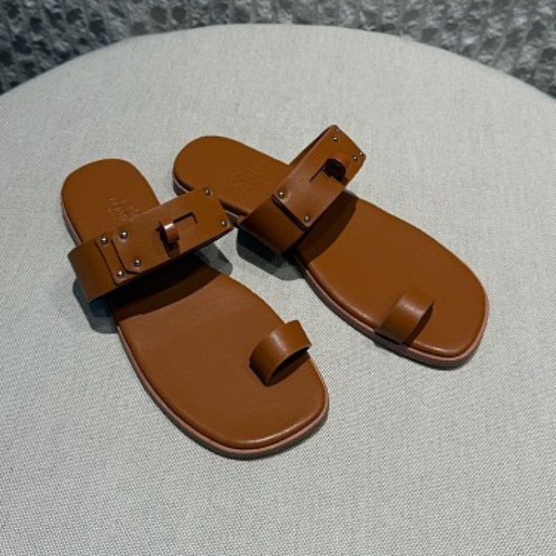 Hermès Empire Sandals.