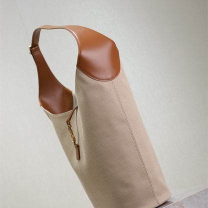 Saint Laurent Le 5 à 7 supple large hobo bag in canvas and leather