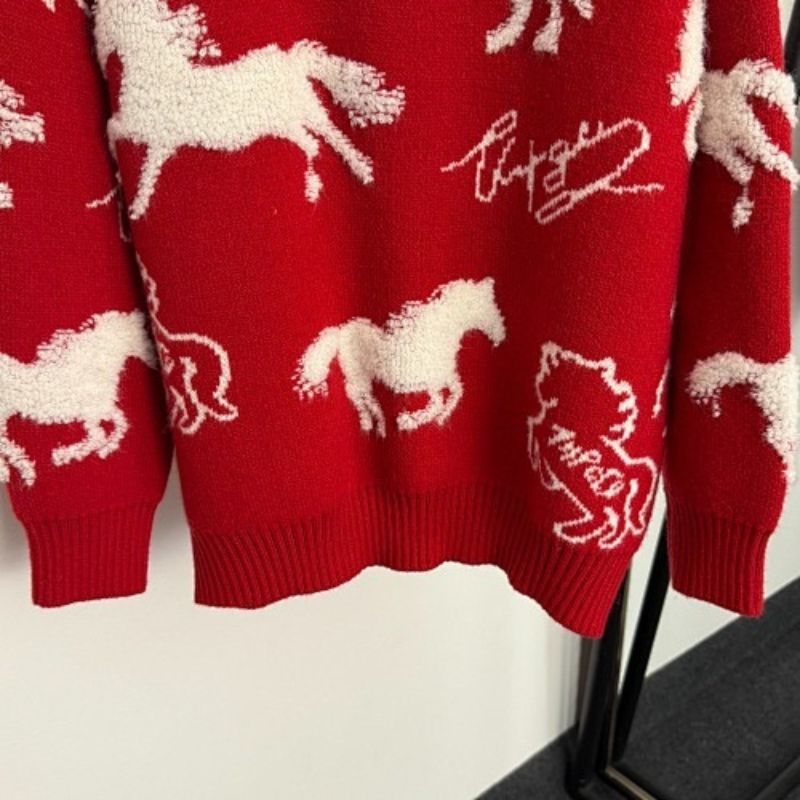 Hermès red knit sweater featuring a white horse motif