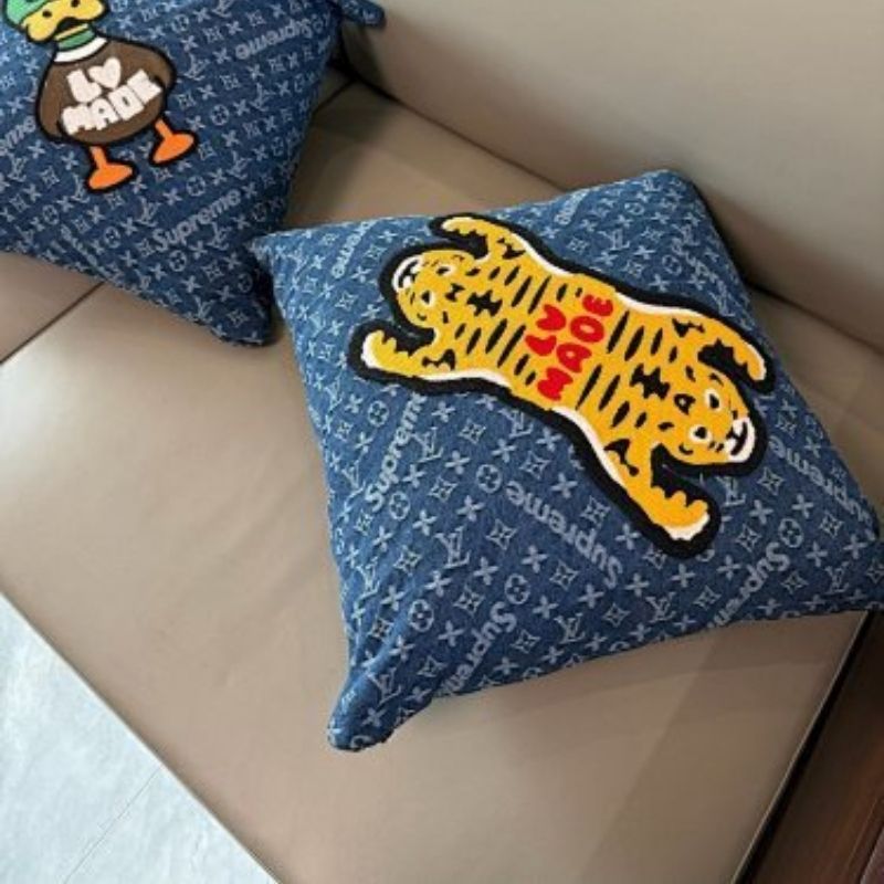 Louis Vuitton x Nigo x Supreme collaboration throw pillow,