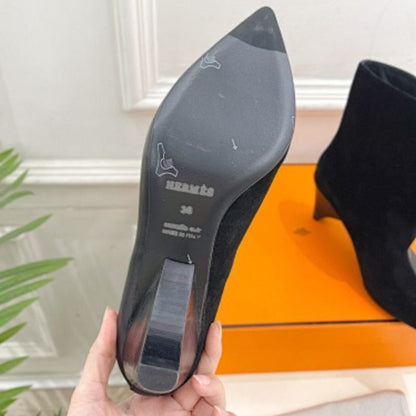 Hermès Rouxa Ankle Boots in a classic noir (black) finish.