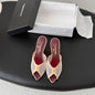 Chanel Mesh Open-Toe Mules in beige and burgundy.
