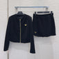 Prada velvet jacket and mini skirt set.