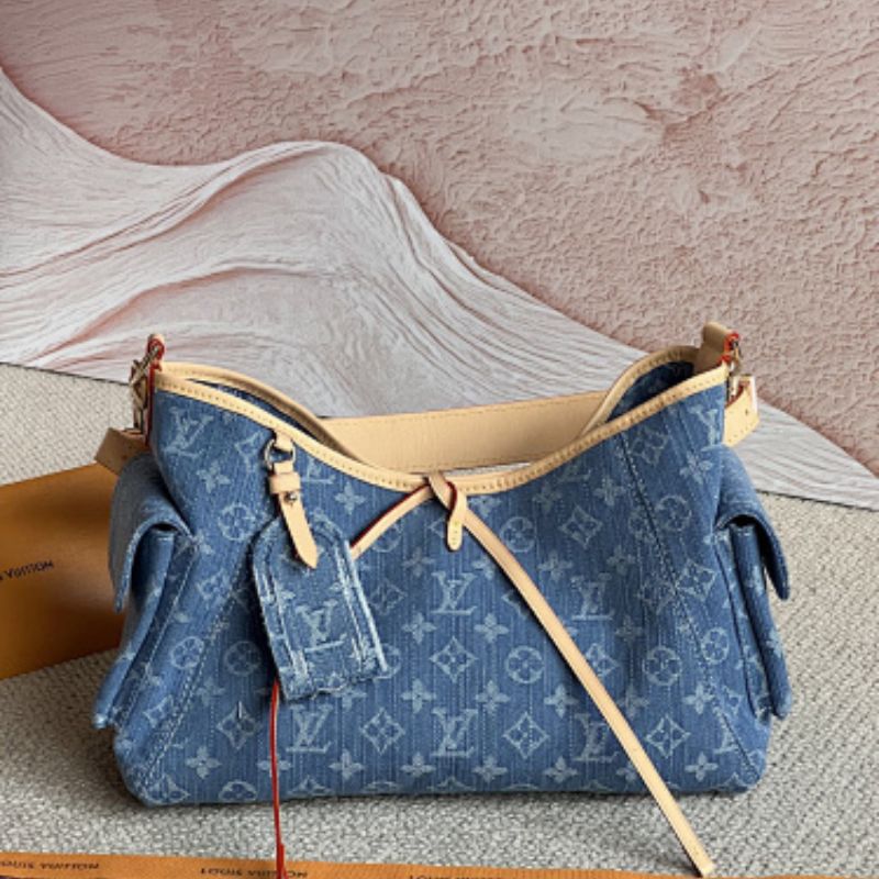Louis Vuitton's Monogram Carryall Cargo PM Louis Vuitton's Monogram Denim collection.