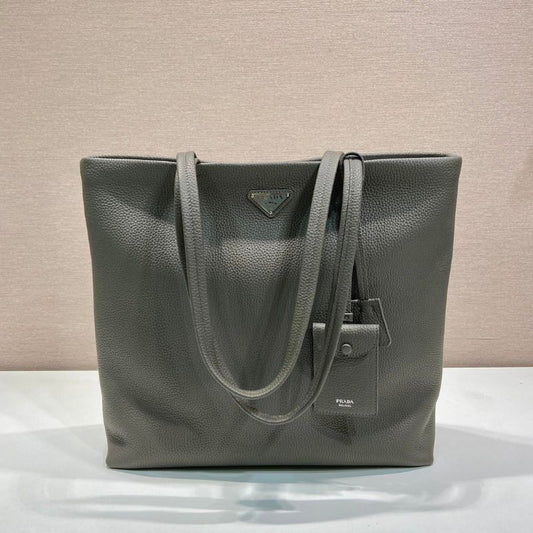 Prada Large Pebbled Leather Tote Bag in clay grey.