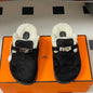 Hermès Carlotta Mules in a cozy shearling variation.