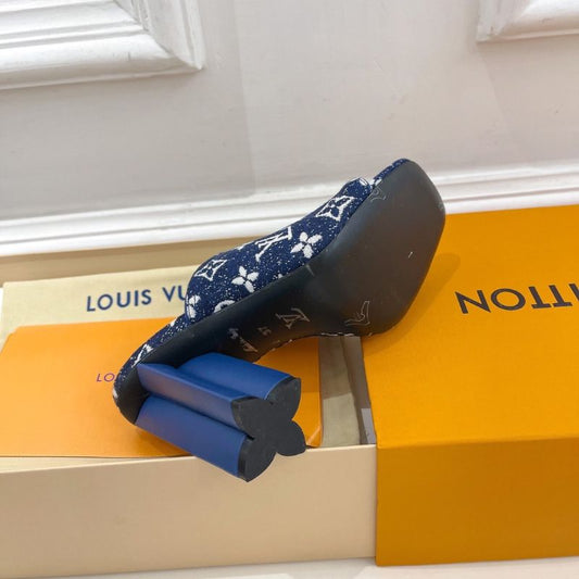 Louis Vuitton Silhouette Mules in blue Monogram denim