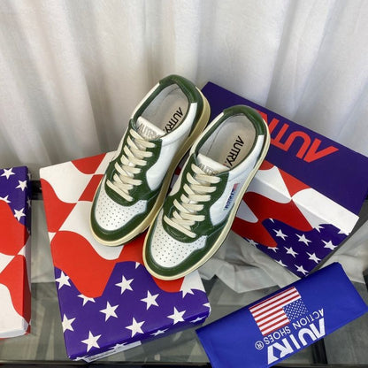 Louis Vuitton Low-Top Sneakers in a white and green