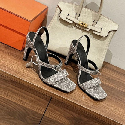 Hermès Lipstick 85 Sandals in a luxurious black and white lizard-embossed leather