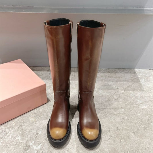Miu Miu Knee-High Boots with a chunky sole