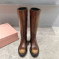 Miu Miu Knee-High Boots with a chunky sole