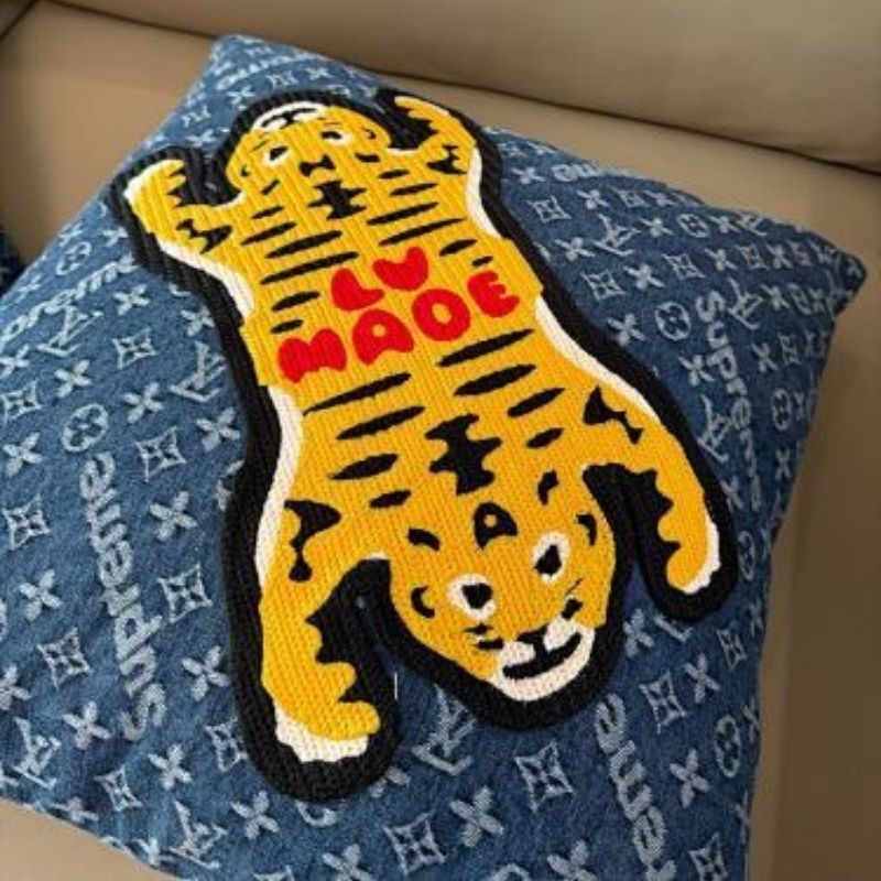 Louis Vuitton x Nigo x Supreme collaboration throw pillow,