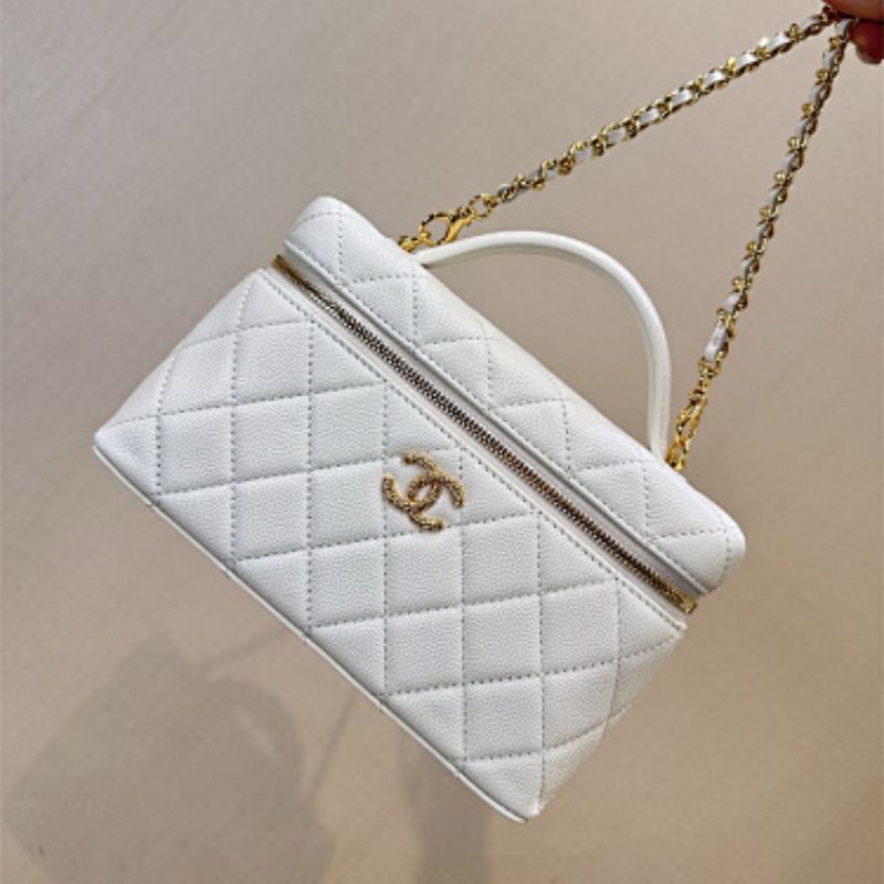 Chanel 26C Vanity Case in White Caviar leather.