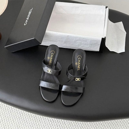 Chanel Crinkled Calfskin Double-Strap Mules.