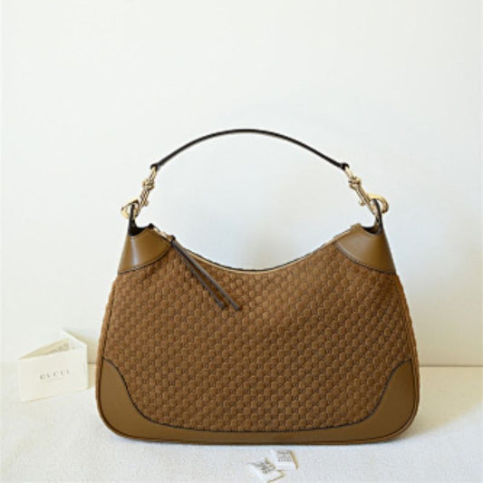 Gucci B medium shoulder bag micro GG-debossed suede with smooth calf leather trim.
