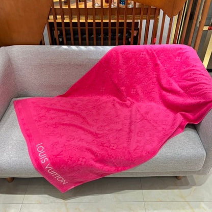 LVacation Beach Towel and Cushion Sets by Louis Vuitton.