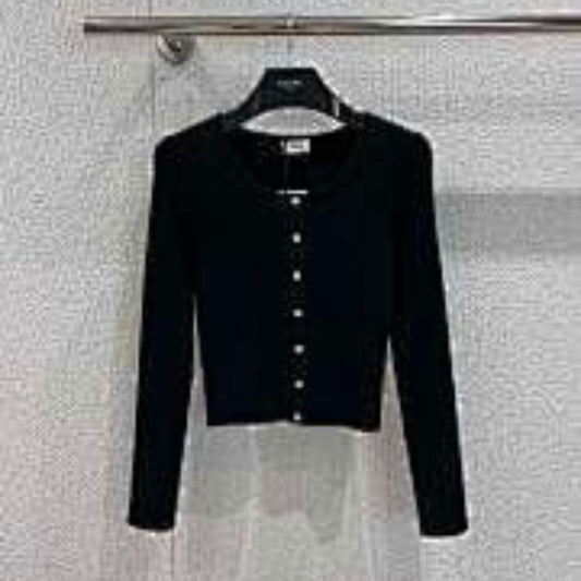 Celine cropped long-sleeved cardigan with metallic buttons.