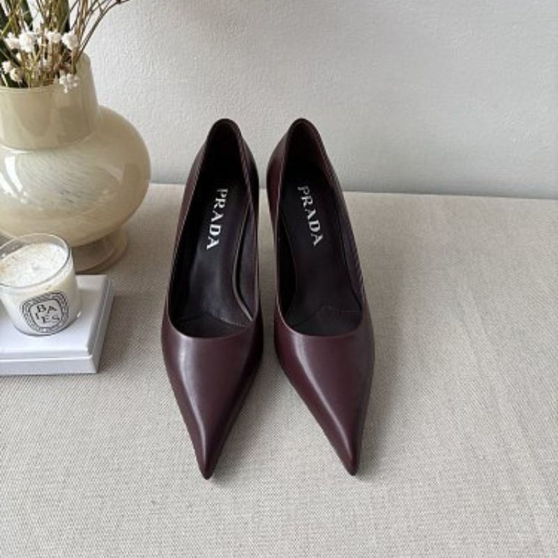 Prada 85mm Pointed-Toe Leather Pumps in a rich burgundy
