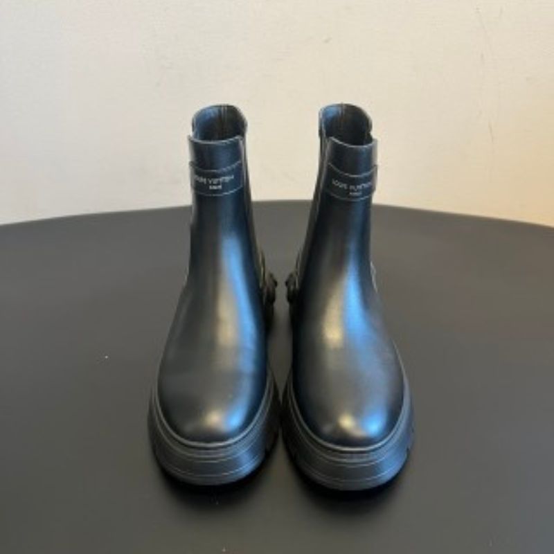 Louis Vuitton LV Squad Chelsea Ankle Boots in black.