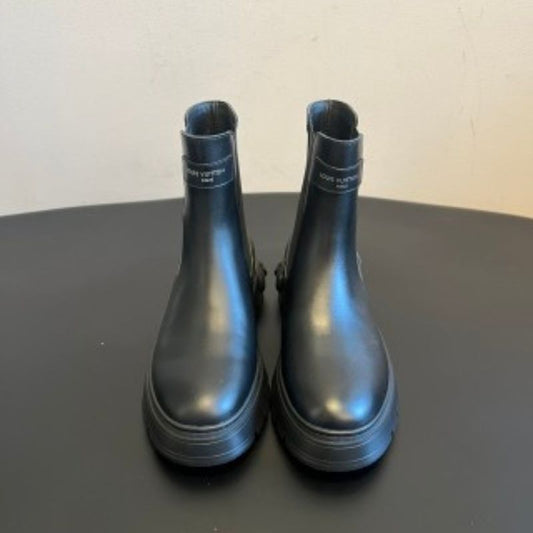 Louis Vuitton LV Squad Chelsea Ankle Boots in black.