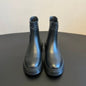 Louis Vuitton LV Squad Chelsea Ankle Boots in black.