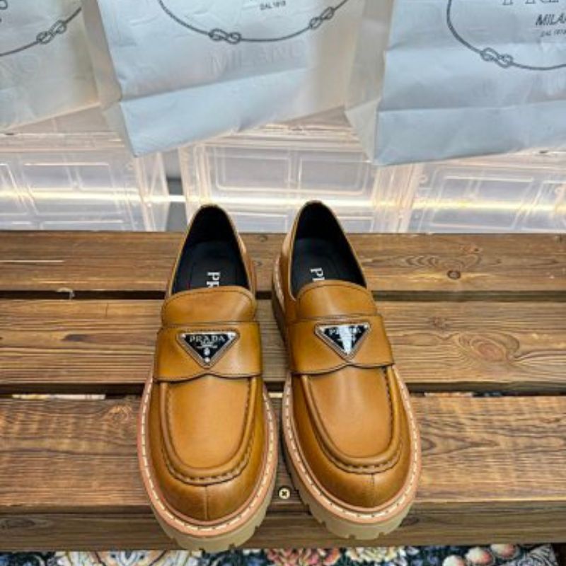 Prada Chocolate Brushed Leather Loafers in a rich cognac brown