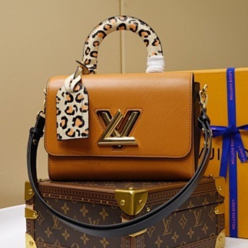 Louis Vuitton Twist MM in Gold Miel