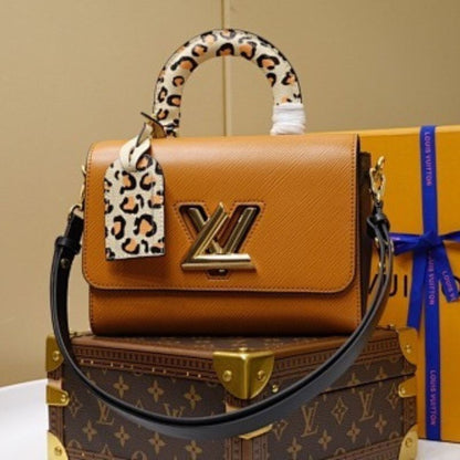 Louis Vuitton Twist MM in Gold Miel