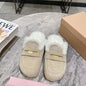 Miu Miu Suede Mules with Shearling lining.
