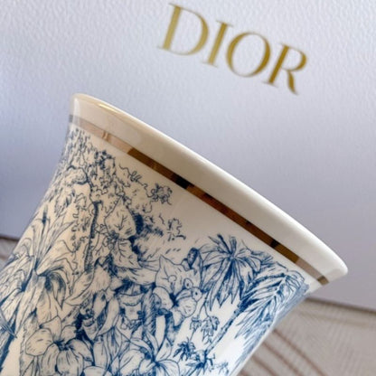 Dior Maison collection the iconic Toile de Jouy motif in blue and white.