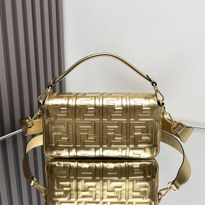 Fendi Baguette NM (New Model) Bag in metallic gold leather.
