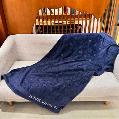 LVacation Beach Towel and Cushion Sets by Louis Vuitton.
