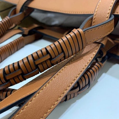 Loewe Anagram Leather Tote with Wicker Handles.