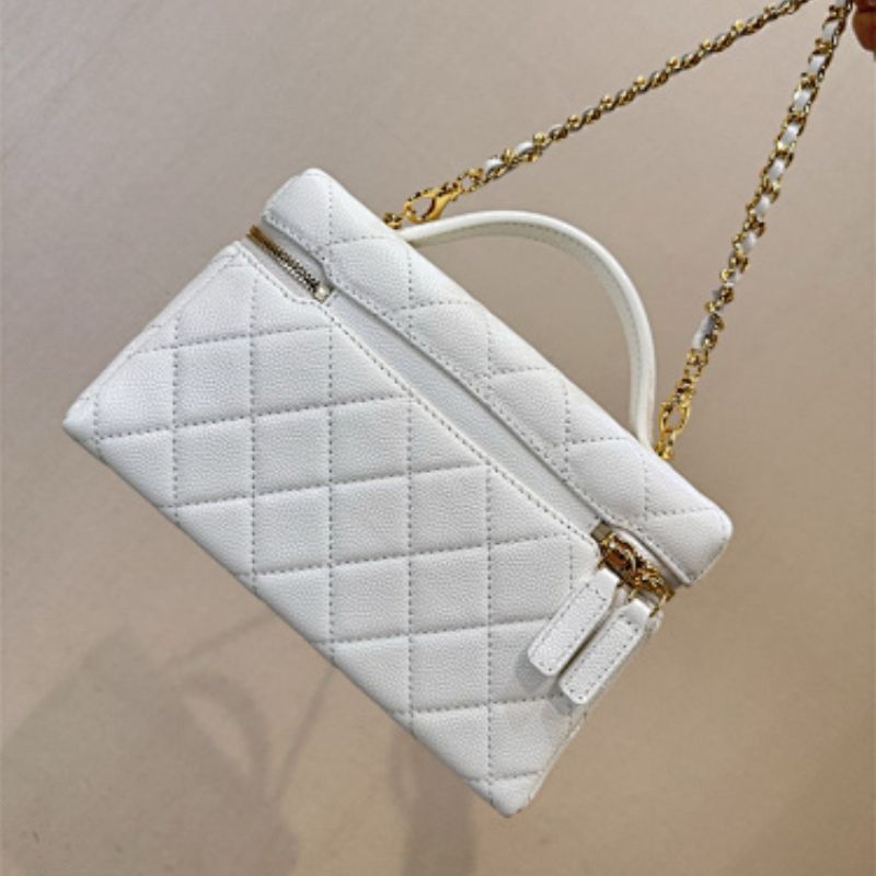Chanel 26C Vanity Case in White Caviar leather.