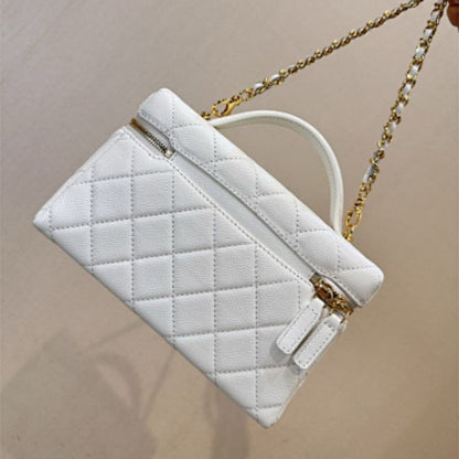 Chanel 26C Vanity Case in White Caviar leather.