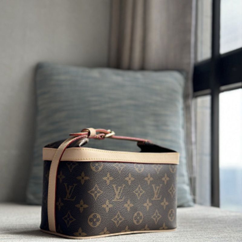 Louis Vuitton Cruiser Toiletry Bag in Monogram coated canvas.