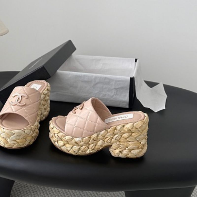Chanel Quilted Interlocking CC Straw Platform Mules in light pink.