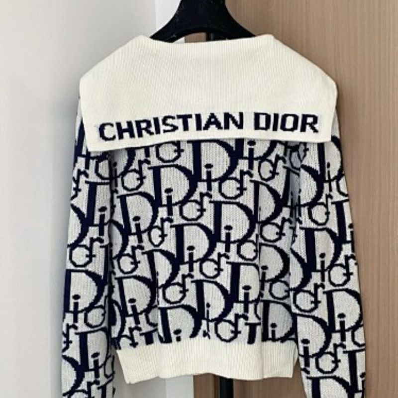 white and navy blue Christian Dior knit top with a white collar