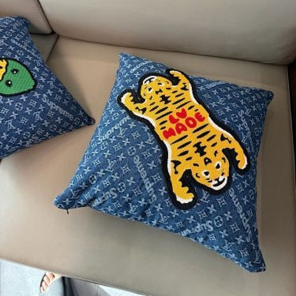 Louis Vuitton x Nigo x Supreme collaboration throw pillow,