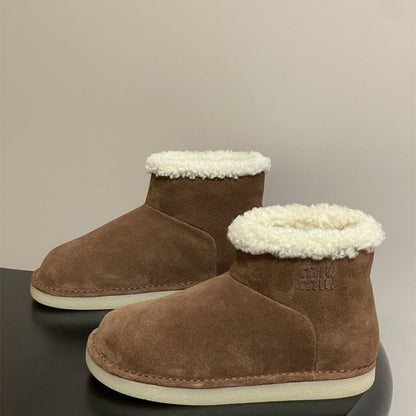 Miu Miu Suede and Shearling Boots.