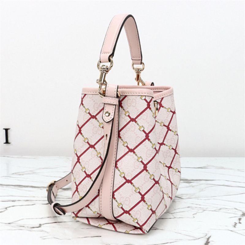 Gucci GG Emblem small bucket bag.