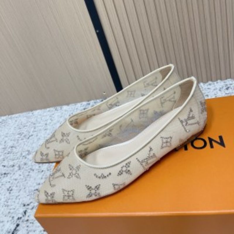 Louis Vuitton Gala Flat Ballerinas in a beige or nude color.