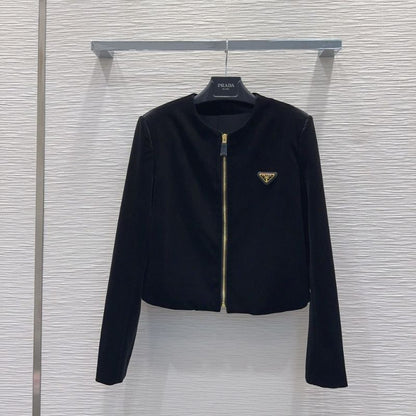 Prada velvet jacket and mini skirt set.