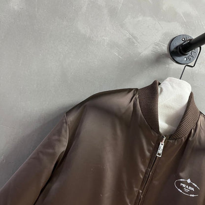 Prada satin blouson jacket.