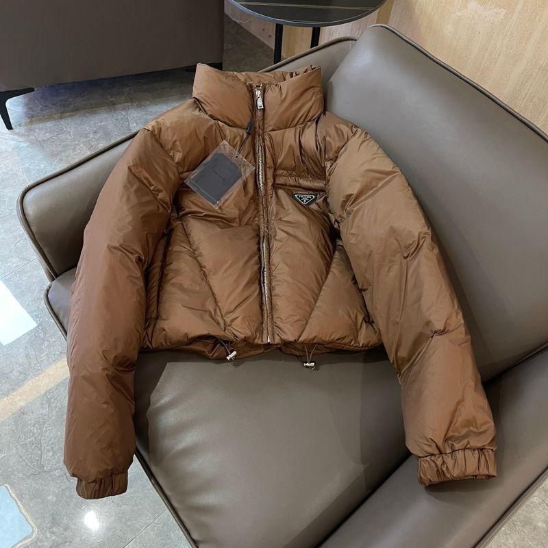 Prada cropped puffer jacket in a brown color