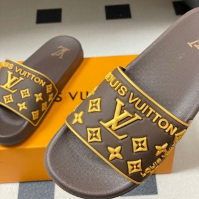 Louis Vuitton Monogram Flats or slides.