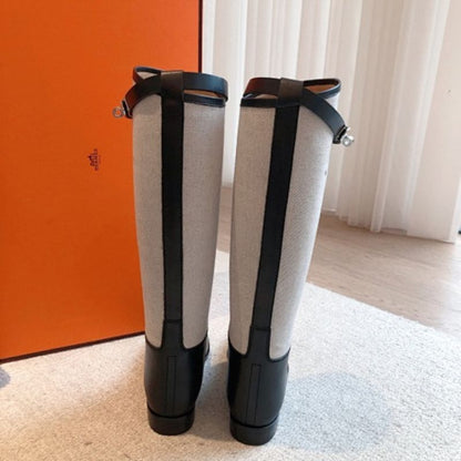 Hermès Jumping Boots in a mixed leather and H canvas (toile)