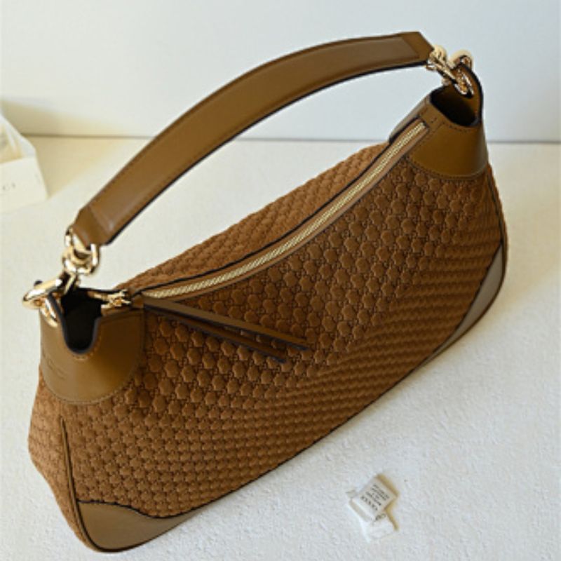 Gucci B medium shoulder bag micro GG-debossed suede with smooth calf leather trim.